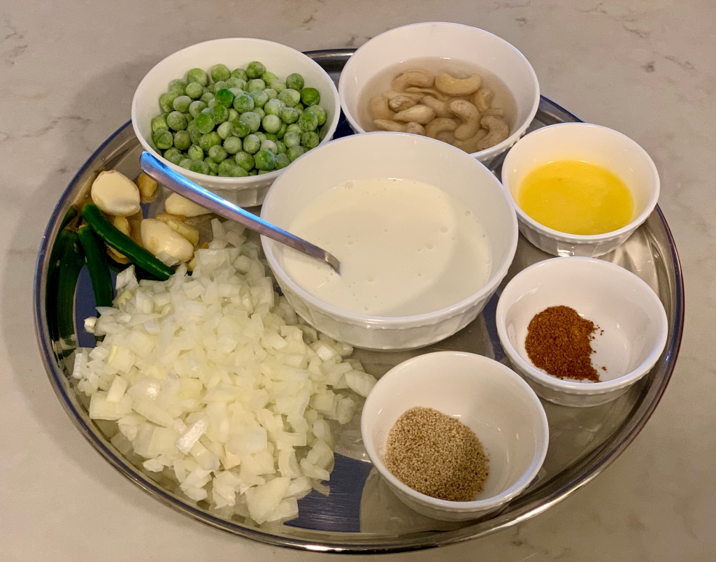 Green peas and white curry base ingredients.